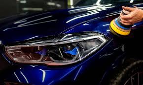 Machine polishing a vehicle's paintwork to a deep, glossy finish